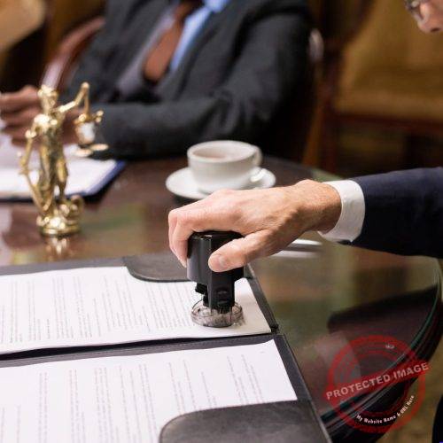 business-professionals-reviewing-legal-documents-a-2026-01-08-22-43-12
